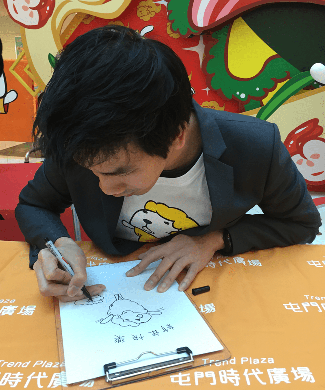 Writing "Happy New Year" for the press.